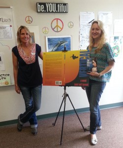 Authors pose with poster of Berend's cover. Great prop!