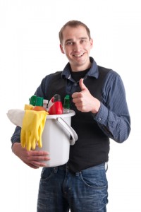 Man with bucket and cleaning supplies