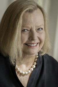 eFrog author Judith Lown is elegant in a black blouse and classic pearls.